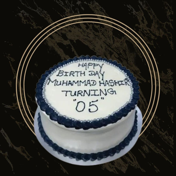 Custom birthday cake with number topper and piped icing details from The Bakers Shop in Birmingham