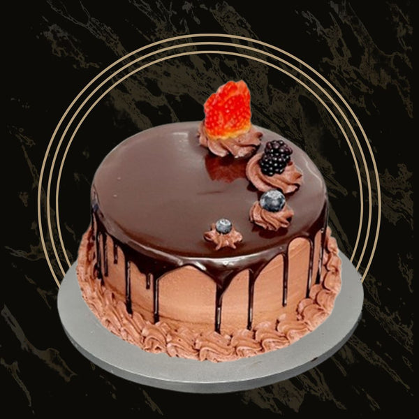 Custom chocolate birthday cake with message piping and sprinkles from The Bakers Shop in Birmingham