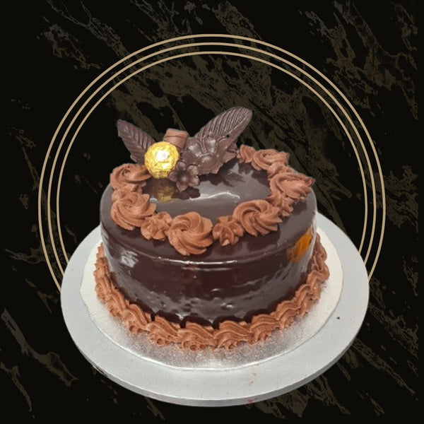 Custom-decorated chocolate cake for special occasions from The Bakers Shop in Birmingham