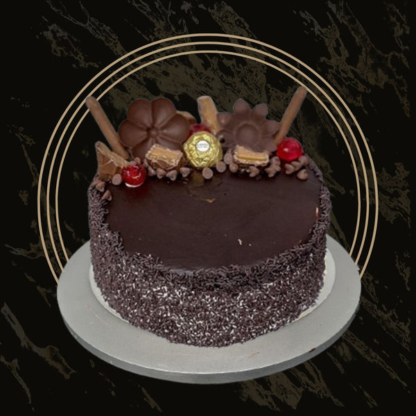 Deluxe chocolate cake with extra fudge filling and chocolate curls from The Bakers Shop in Birmingham
