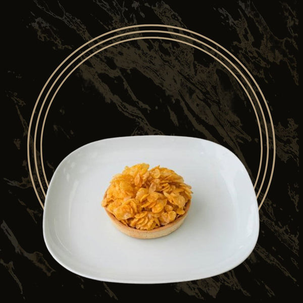 Crunchy corn flakes tarts with caramelized syrup and a buttery crust from The Bakers Shop in Birmingham
