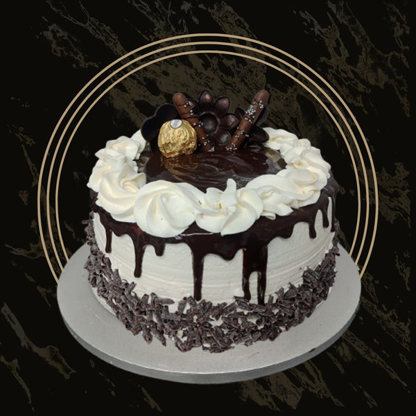 Luxury design fancy cake with gold accents and smooth finish from The Bakers Shop in Birmingham