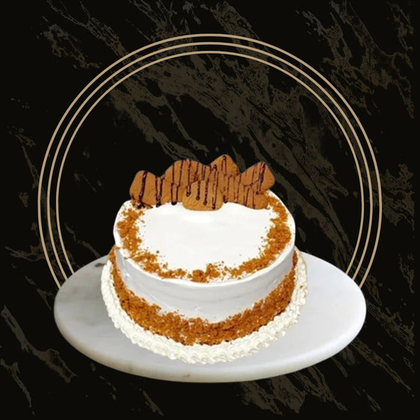 Lotus cake with caramel center and decorative biscuit topping from The Bakers Shop in Birmingham