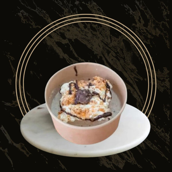 Moist milk cake soaked in sweet cream and topped with whipped frosting from The Bakers Shop in Birmingham