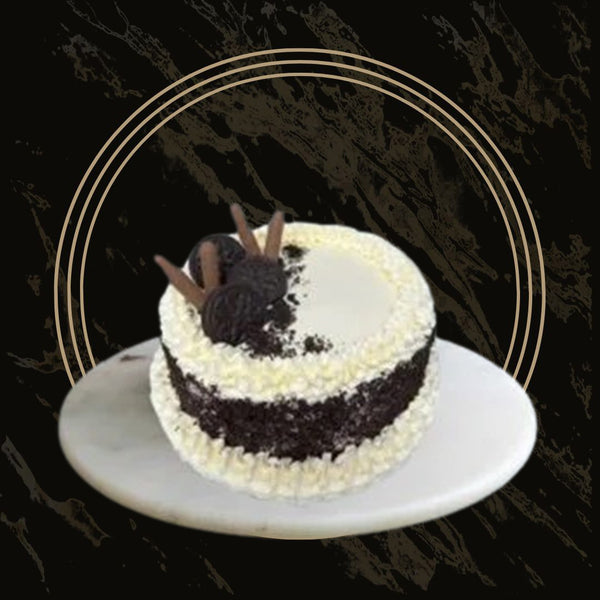 Celebration-style Oreo cake with layered cookies and piped frosting from The Bakers Shop in Birmingham