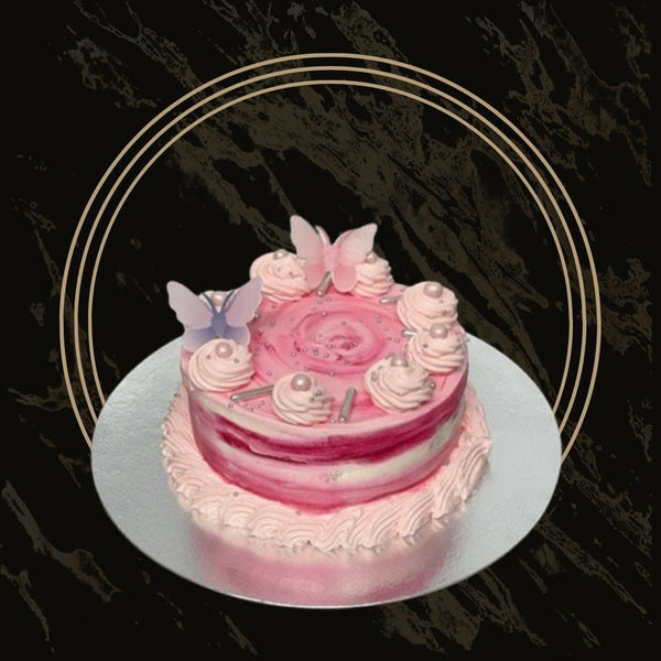 Mini heart-shaped bento cake with piped design in a gift box from The Bakers Shop in Birmingham