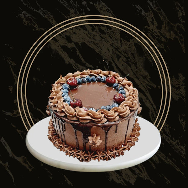 Chocolate Eid cake with rich ganache and elegant decorations from The Bakers Shop in Birmingham

