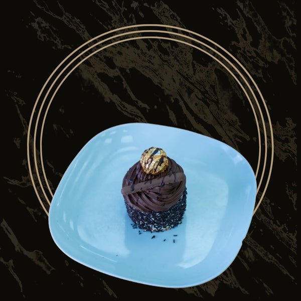 Chocolate Victoria cupcakes with soft sponge, rich cream, and chocolate filling from The Bakers Shop in Birmingham