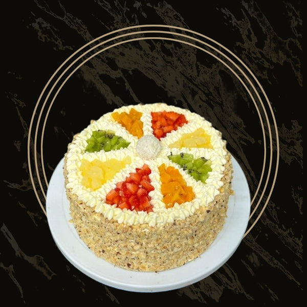 Elegant fruit cake suitable for weddings, topped with dried fruit from The Bakers Shop in Birmingham
