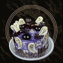Dark chocolate Haunted Delight cake with spooky tree design and ghostly decorations from The Bakers Shop in Birmingham