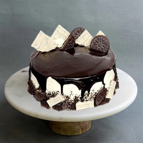 Oreo Mother’s Day cake with chocolate layers, cream frosting, and Oreo cookie toppings from The Bakers Shop in Birmingham.